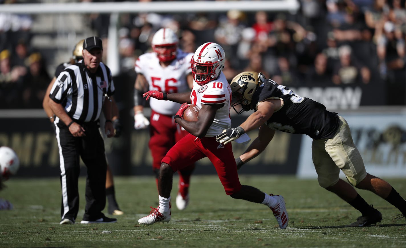 Nebraska Cornhuskers wide receiver JD Spielman (10) is tackled by Colorado Buffaloes linebacker Nate Landman in the second half overtime of an NCAA college football game Saturday, Sept. 7, 2019, in Boulder, Colo. Colorado won 34-31 in overtime. (AP Photo/David Zalubowski) ORG XMIT: OTKDZ253