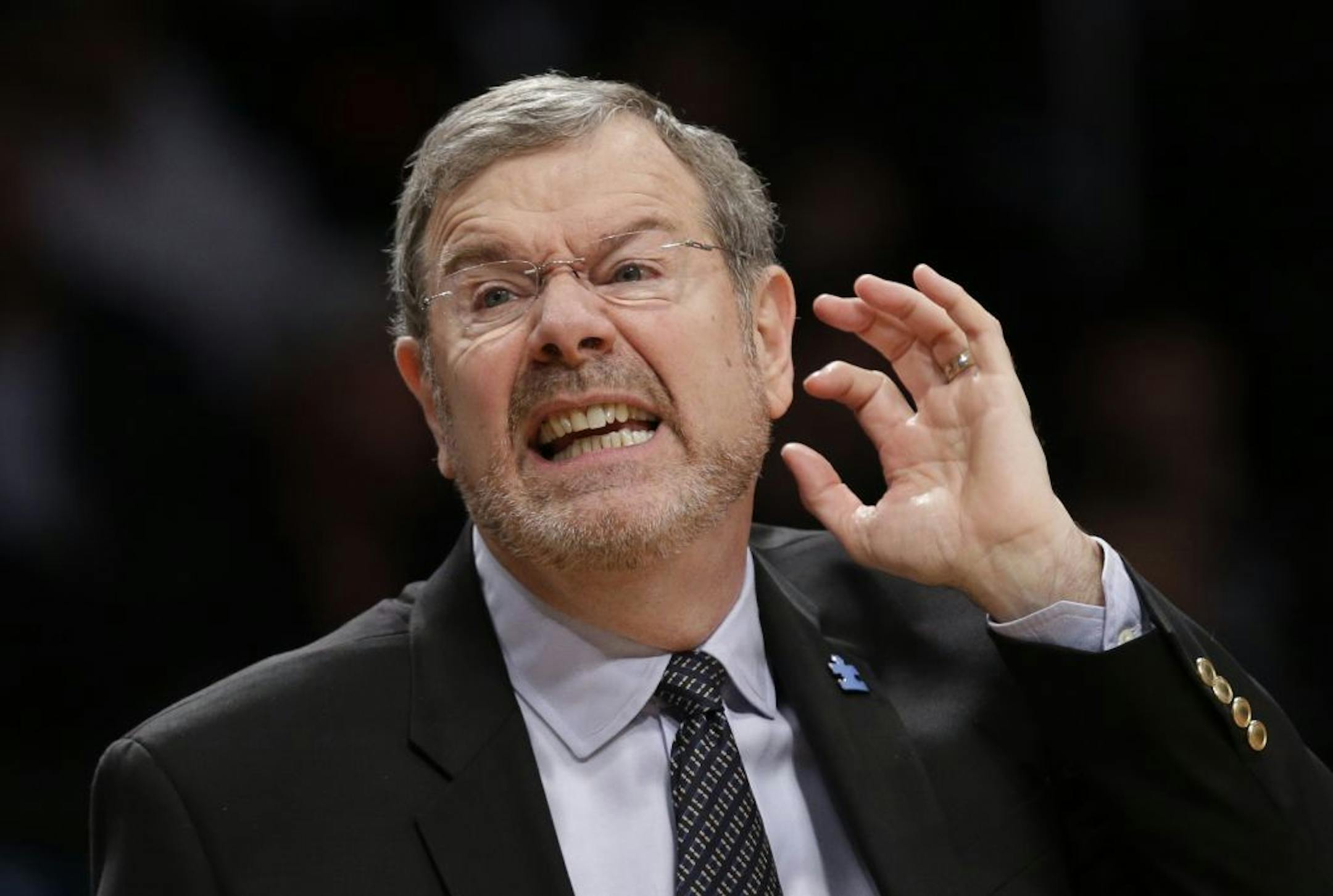 FILE - In an April 22, 2013, file photo Brooklyn Nets interim head coach P.J. Carlesimo reacts in the second half of Game 2 of a first-round NBA basketball playoff series against the Chicago Bulls in New York. Brooklyn Nets general manager Billy King says P.J. Carlesimo will not return as coach.