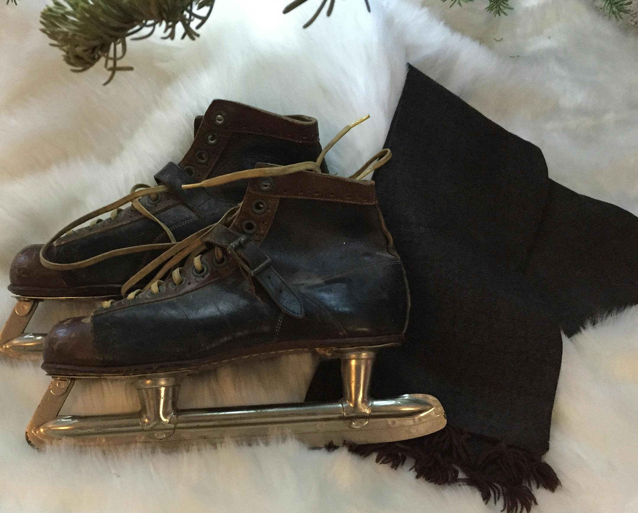 My Father';s wool scarf and ice skates from the early 1940s New York City. These skates and scarf of my father’s, Dr Richard Nacewski (1930-1993) were gently placed in the 'donate' box by my mother. I claimed them right away. While I had never seen them before they quickly became a true treasure and the dominate fixture under our Christmas tree each year. Jennifer Weichert, Mendota Heights