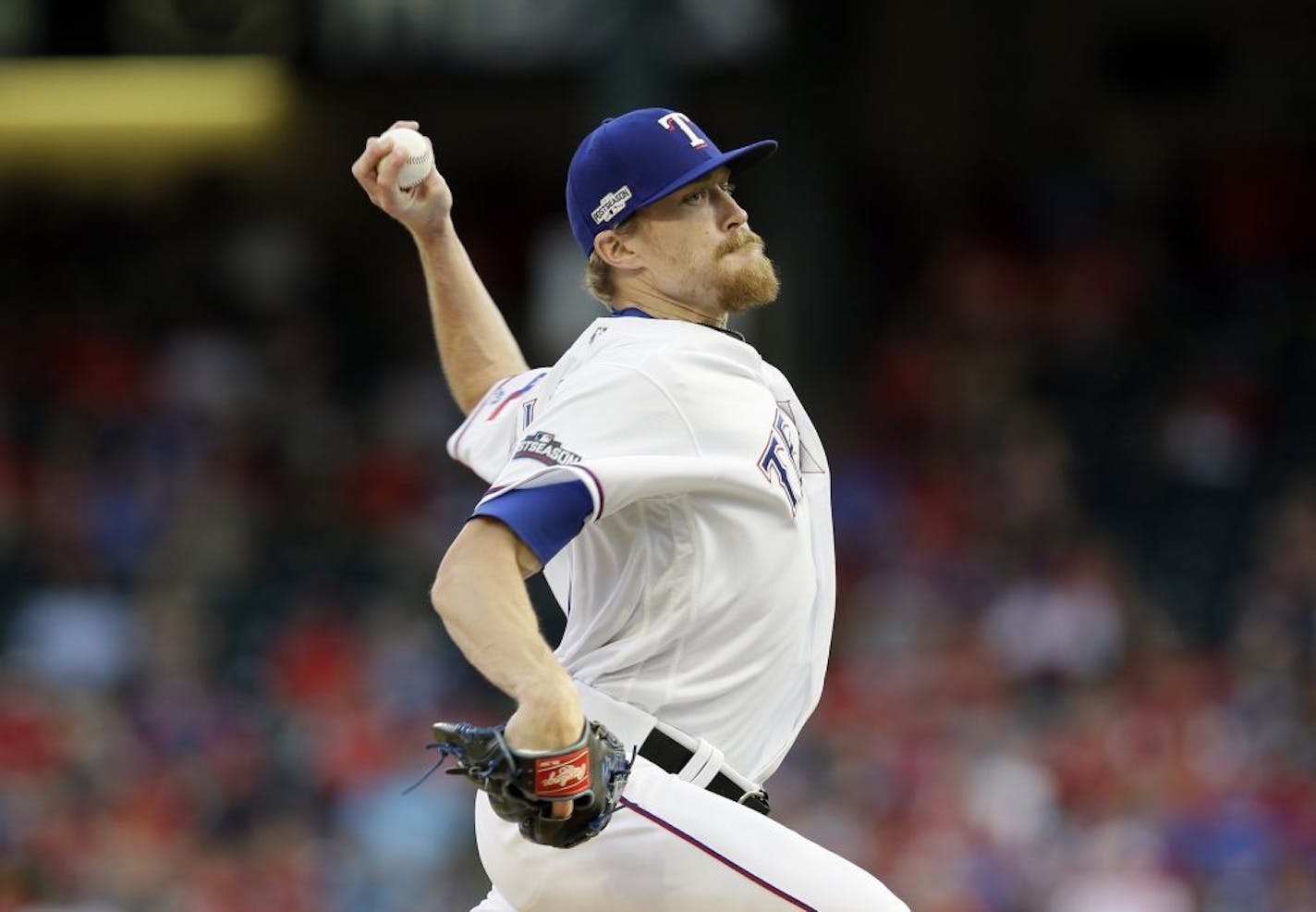 Texas Rangers relief pitcher Jake Diekman throws to the Toronto Blue Jays during the ninth inning of Game 1 of baseball's American League Division Series, Thursday, Oct. 6, 2016, in Arlington, Texas.