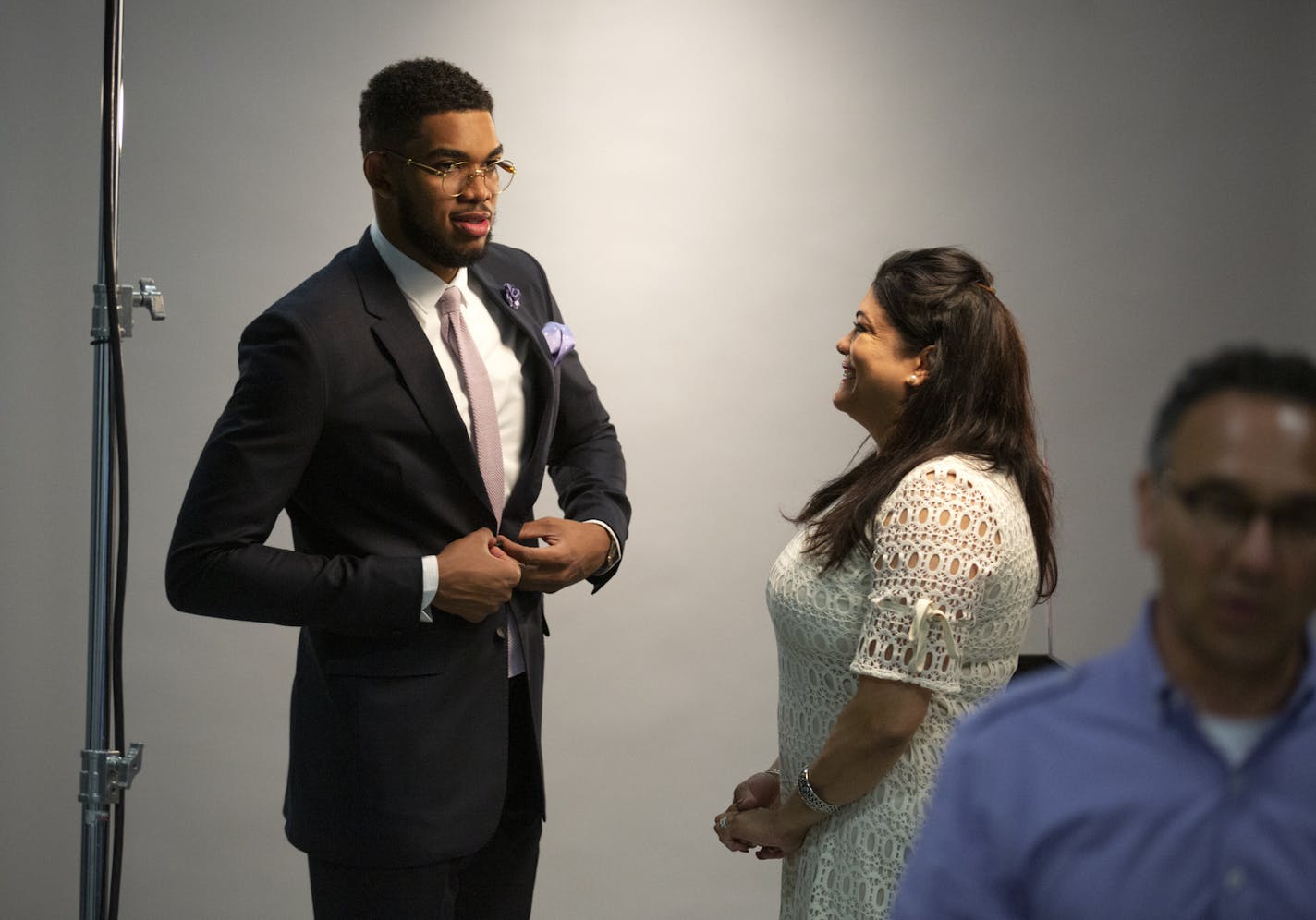 After a weekslong battle with COVID-19, Jacqueline Cruz, the mother of Timberwolves center Karl-Anthony Towns, died Monday as a result of the virus, the Wolves said. She was 59. Here, Cruz waited with her son as he had his official pictures taken by team photographer David Sherman (right) after being named NBA Rookie of the Year in 2016.] brian.peterson@startribune.com
Minneapolis, MN Monday, May 16, 2016