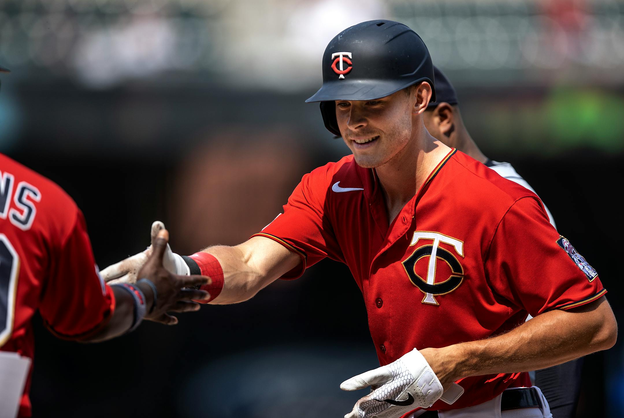 Minnesota Twins Max Kelpler shook hands with first base coach Tommy Watkins after getting a hit .] Jerry Holt •Jerry.Holt@startribune.com