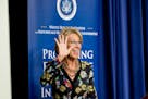 Education Secretary Betsy DeVos waves as she steps away from the podium after speaking at the White House Summit on Historically Black Colleges and Un