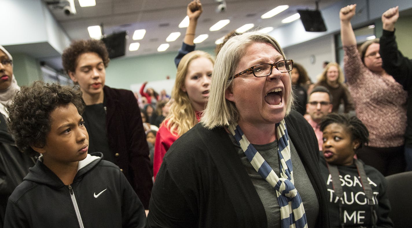 Susan Montgomery and her 11-year-old son, Taye Clinton, left, interrupted the St. Paul School Board meeting Tuesday night during a demonstration. ] (AARON LAVINSKY/STAR TRIBUNE) aaron.lavinsky@startribune.com As the St. Paul school board gets set to vote Tuesday on a teachers contract containing new school-safety provisions, the district reports that assaults on staff members are up from a year ago. In fact, the 44 assaults reported to the district's emergency call center already exceed the 41 r