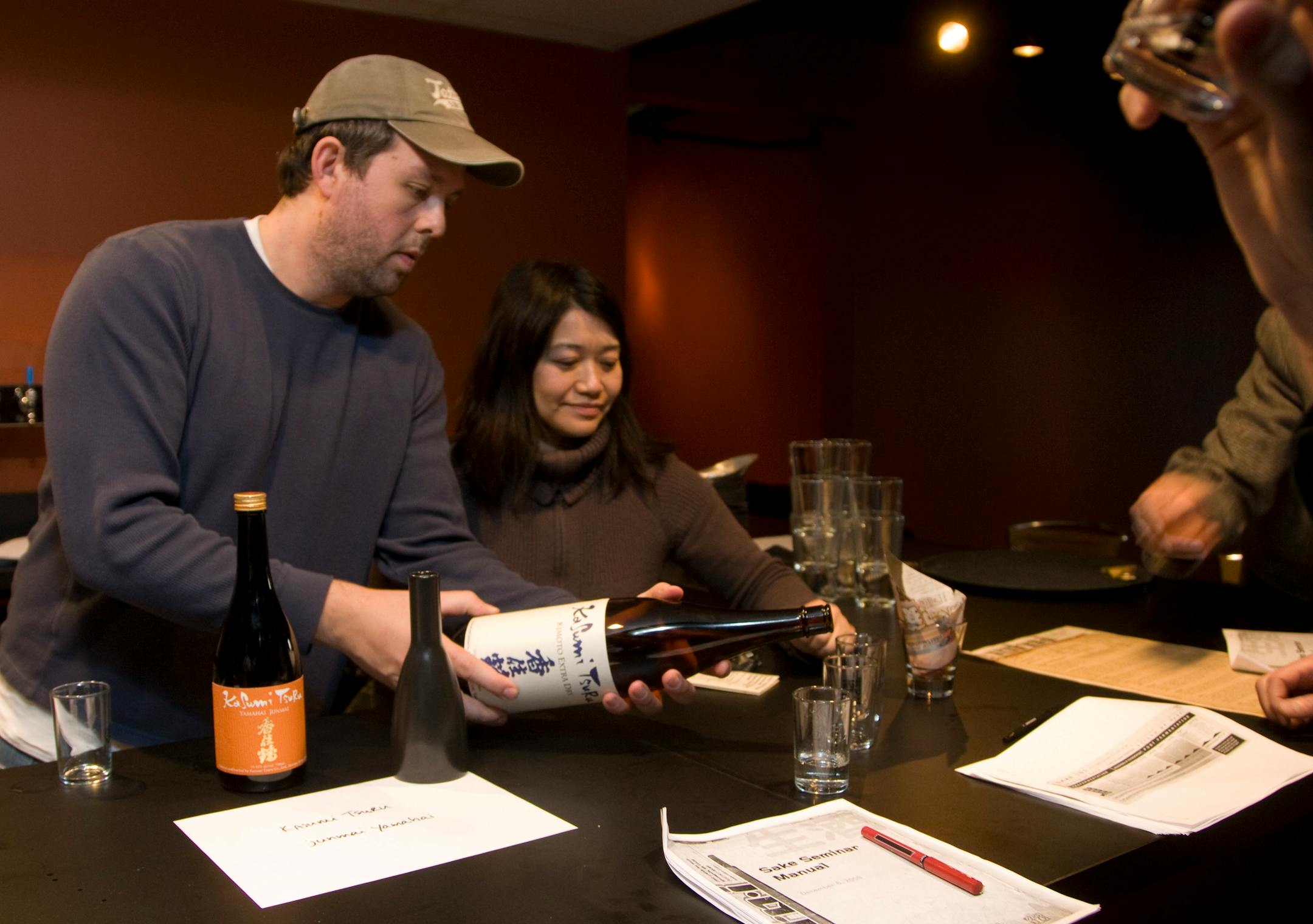 Moto-i owner Blake Richardson and his assistant brewer, Elise Gee, poured samples of Japanese brew at a recent eight-hour (!) sake seminar for connoisseurs who paid $150 apiece. He holds the event once a month.
