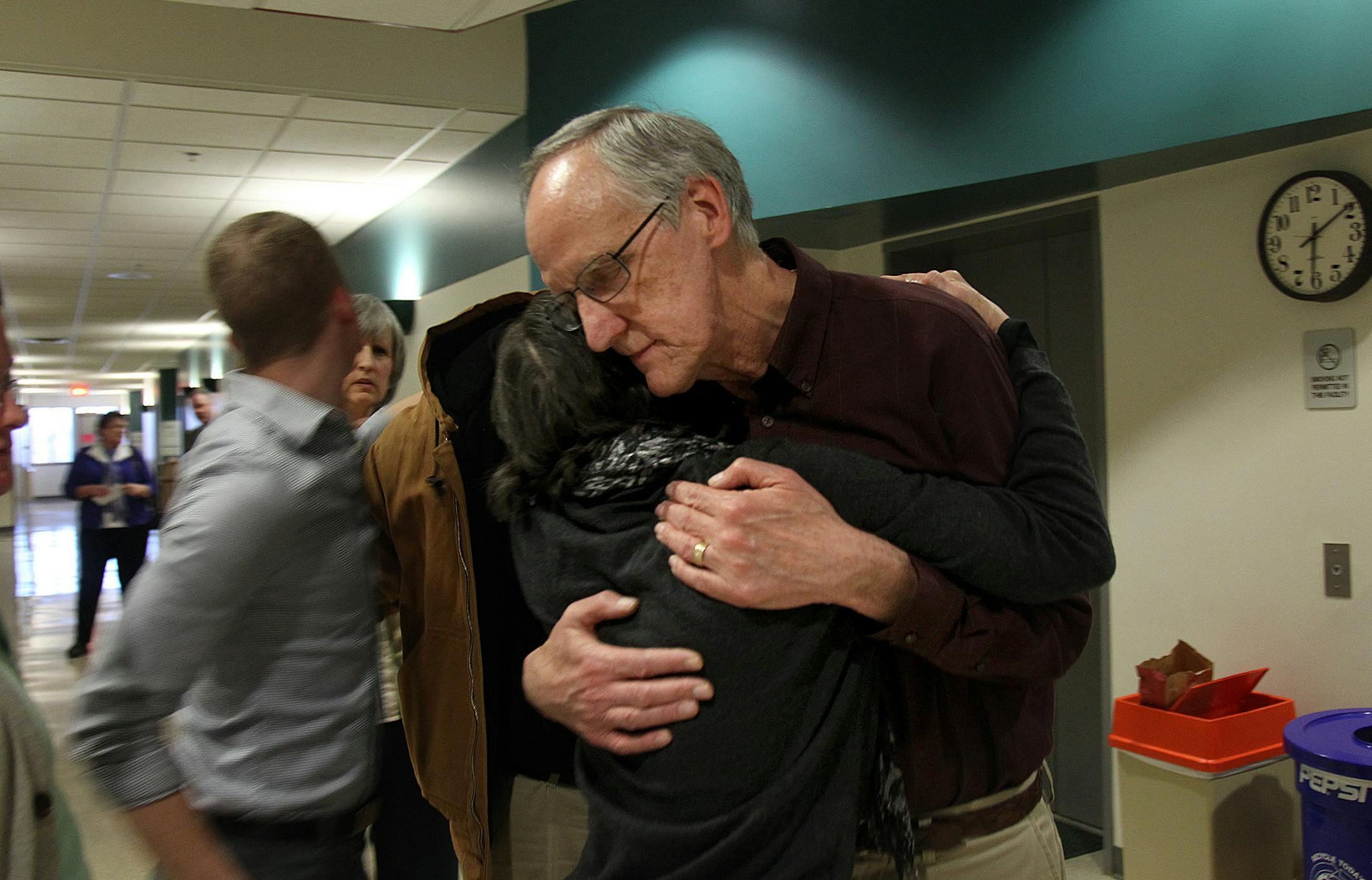 Aaron Schaffhausen's father Roger Schaffhausen was comforted in the court hallway after jurors rejected his son's insanity defense in a St. Croix County Courtroom in Hudson, Wis., Tuesday, April 16, 2013. (ELIZABETH FLORES/STAR TRIBUNE) ELIZABETH FLORES • eflores@startribune.com