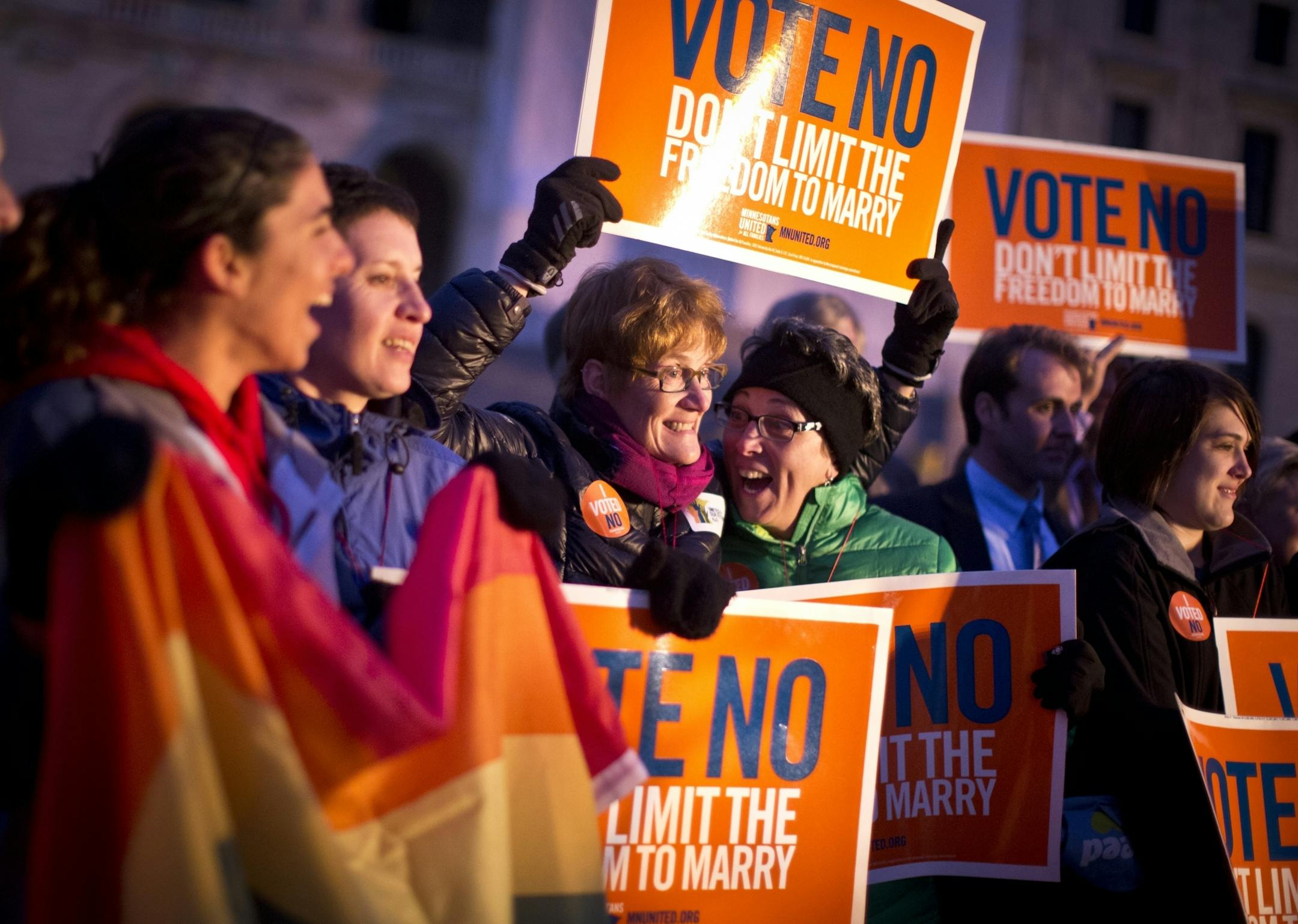 Lynne Hvidsten and Cindy Amberger, who have been in a relationship for 20 years, were among the marriage amendment opponents who held a victory rally on the steps of the State Capitol the night after the 2012 election.