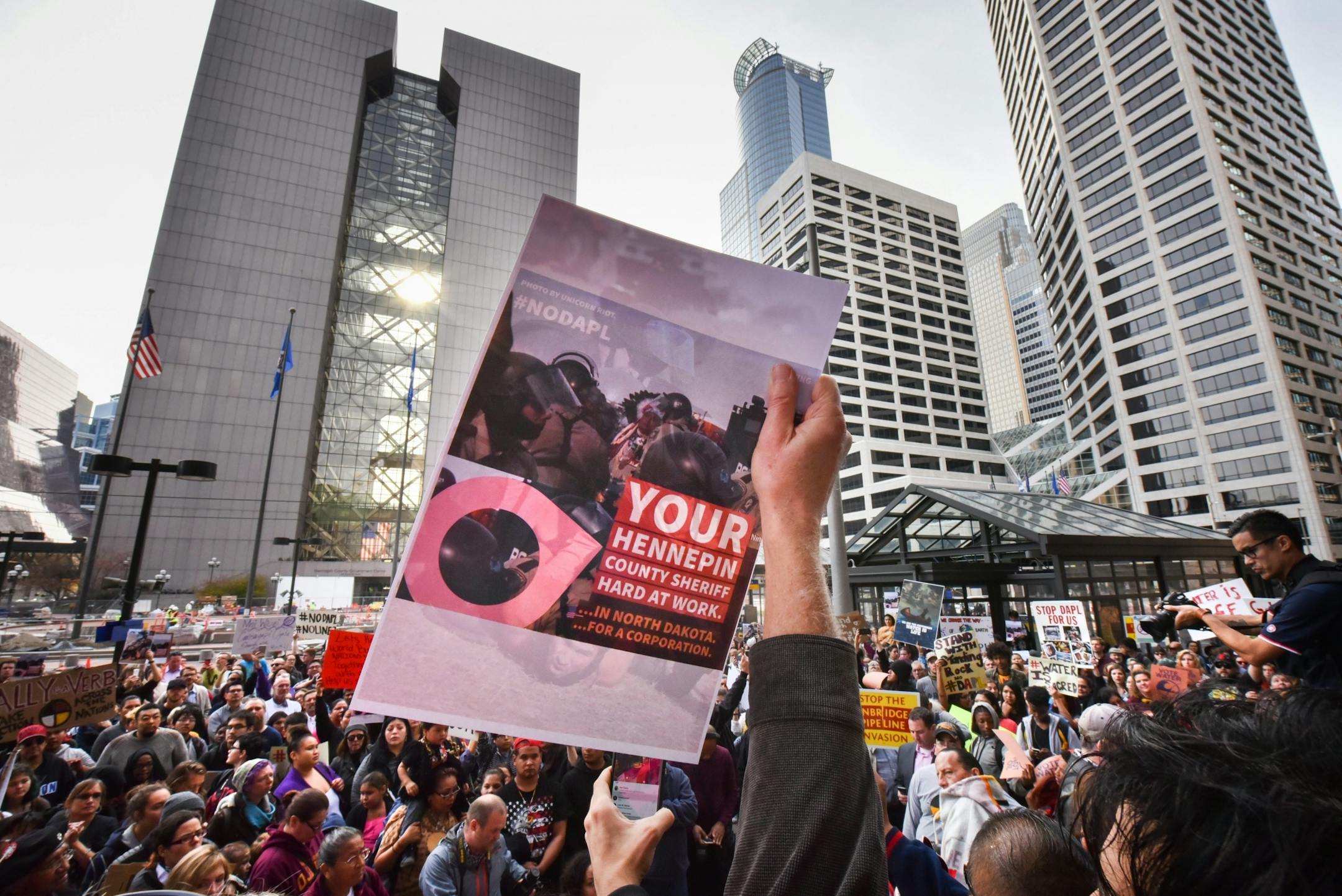 Protesters outside Minneapolis City Hall were angered that Hennepin County Sheriff deputies were participating in Standing Rock where Native People are fighting the pipeline.