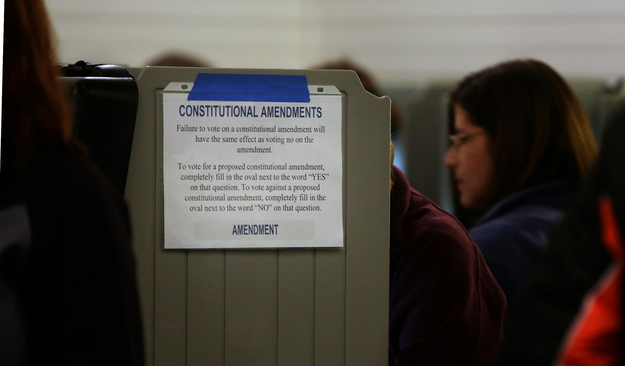 A sign inside the Stillwater Township Hall reminded voters that failure to vote on a constitutional amendment will have the effect of voting "no" on the amendment.