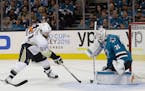 Pittsburgh Penguins right wing Phil Kessel (81) shoots against San Jose Sharks goalie Martin Jones (31) during the first period of Game 6 of the NHL h