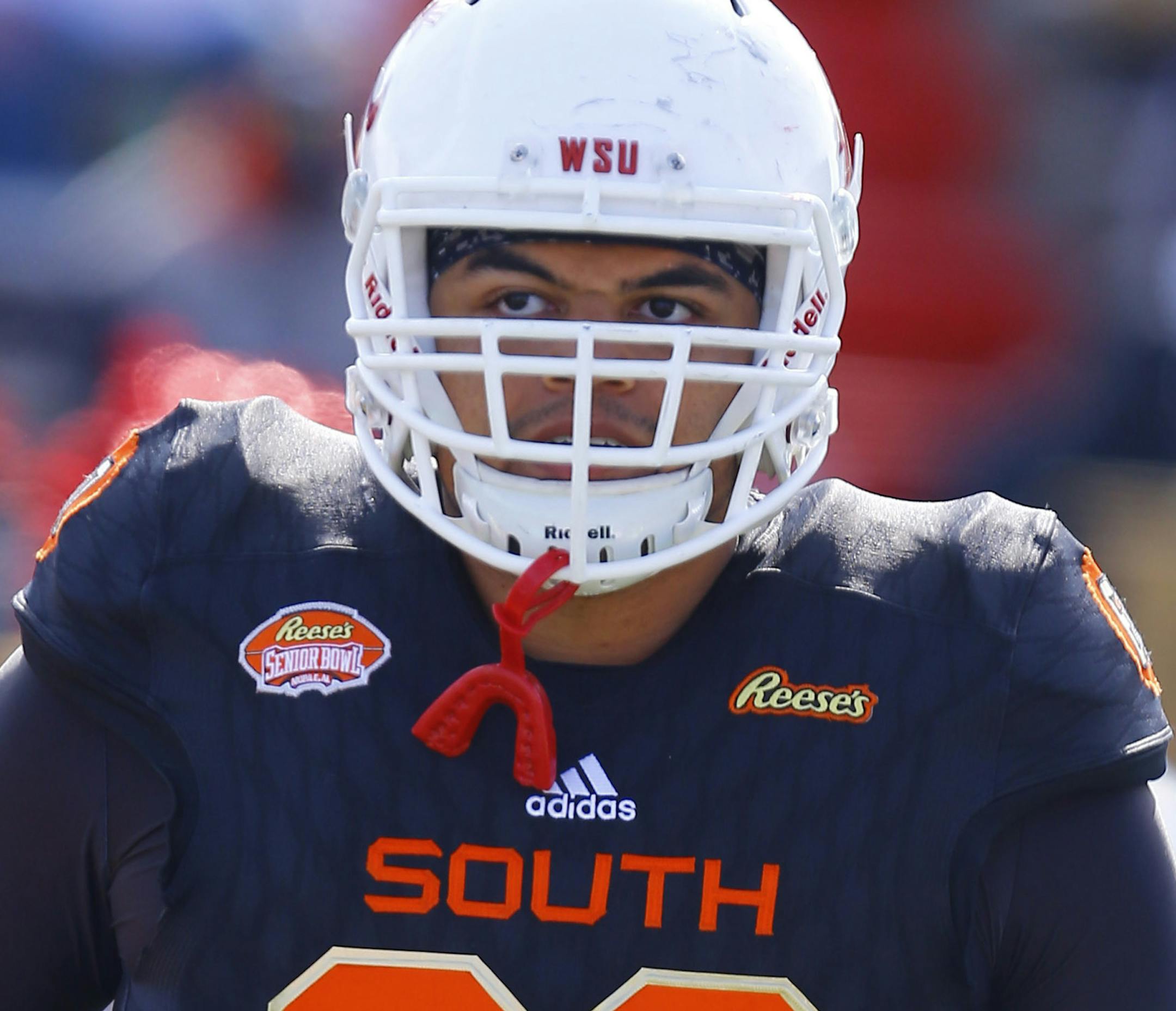 South offensive tackle Andre Dillard of Washington State (60) before the start of the Senior Bowl college football game, Saturday, Jan. 26, 2019, in Mobile, Ala. (AP Photo/Butch Dill)