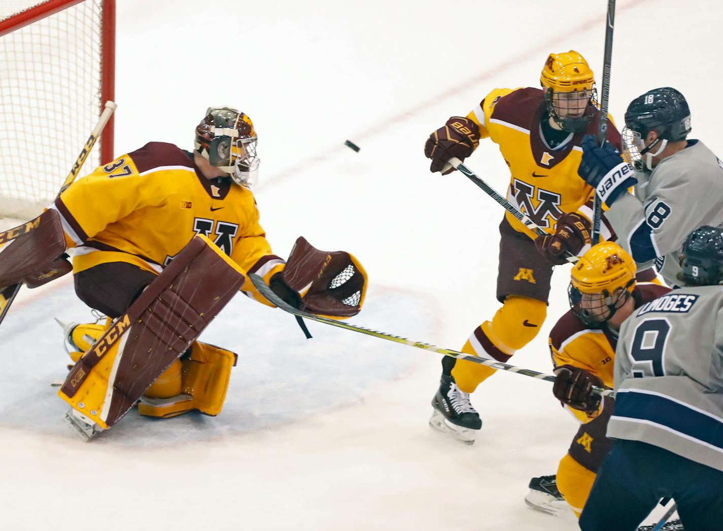 Gophers goalie Eric Schierhorn(37) makes a save.] Sunday afternoon Gophers hockey game, vs. Penn State. at Mariucci 3M Arena.Richard Tsong-Taatarii/Richard.tsong-taatarii@startribune.com