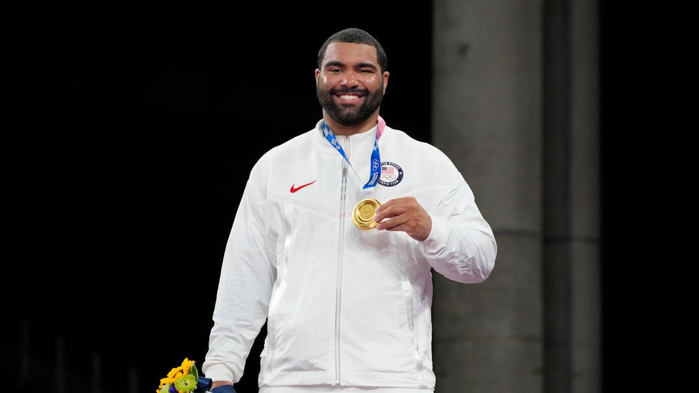 United States' Gable Dan Steveson celebrates with his gold medal during the victory ceremony for men's freestyle 125kg wrestling at the 2020 Summer Olympics, Friday, Aug. 6, 2021, in Chiba, Japan. (AP Photo/