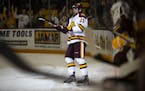 UMD forward Jackson Cates (20) celebrated after scoring an empty net goal with less than a minute left in the third period to seal a 2-0 victory for t