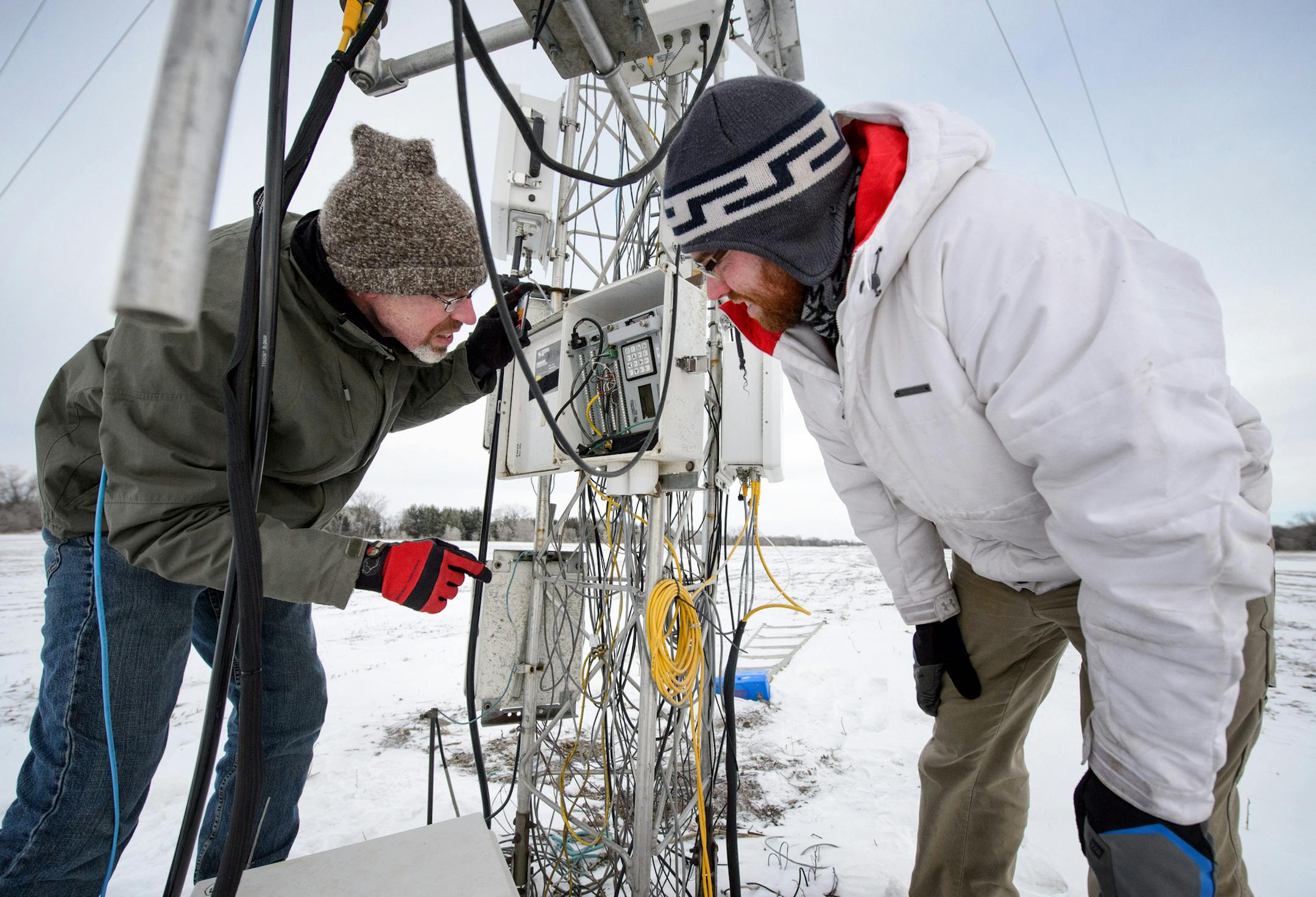 University of Minnesota research assistants Bill Breiter and Jeff Wood gather data for their atmospheric science research at UMore Park in Rosemount. They are researching the carbon balance of agricultural systems there. ] GLEN STUBBE * gstubbe@startribune.com Monday, February 23, 2015
