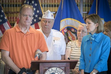 Stephen Schmalz, a Gulf War Veteran, shared his story regarding a lending scam before other veterans, seniors, and Attorney General Lori Swanson durin