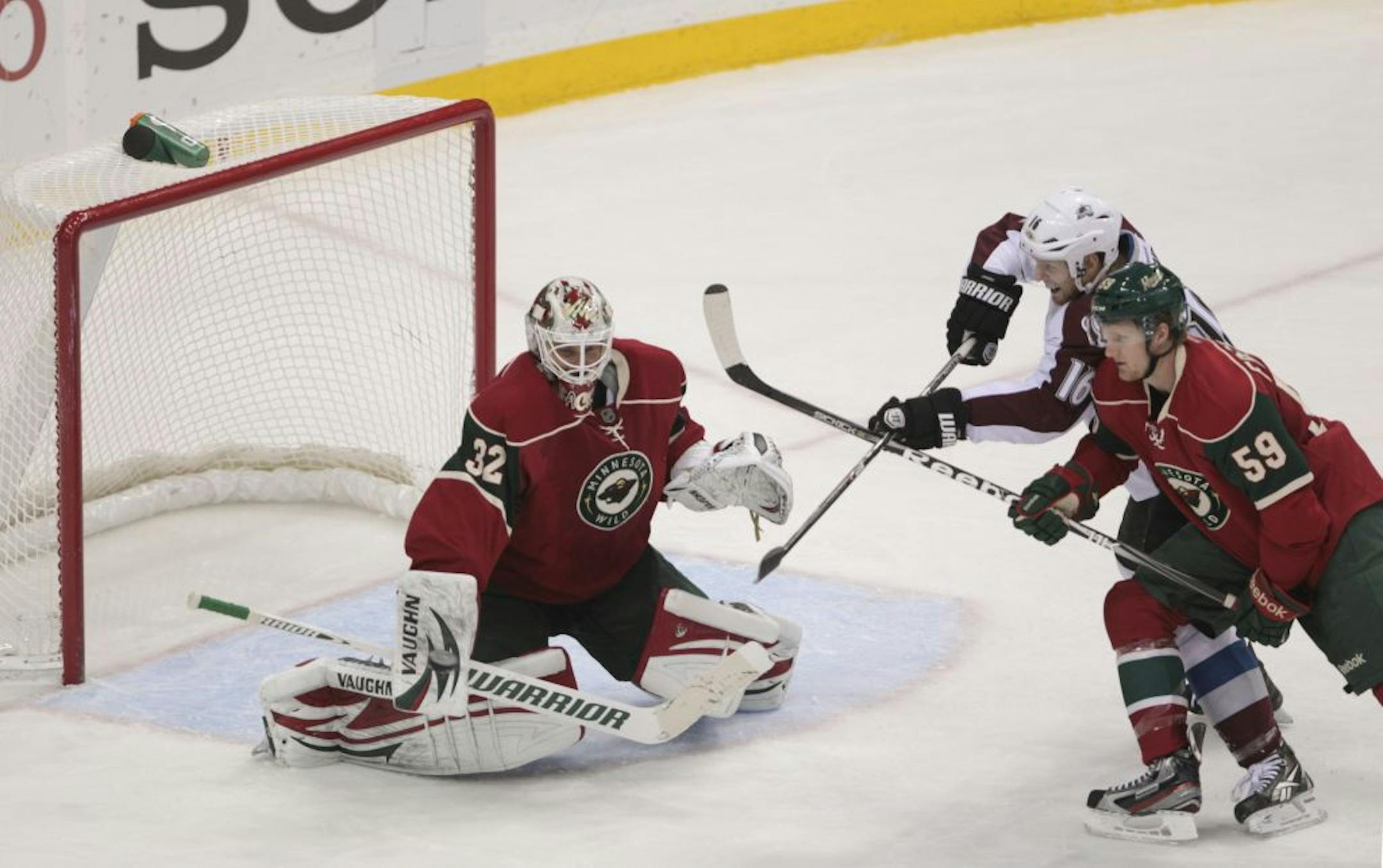 Former Colorado College defenseman Kris Fredheim (59) made his Wild debut on Thursday night.