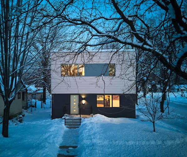 A south Minneapolis home ‘pops the top’ to make things roomier while staying within tiny footprint. Helical piers, or steel shafts with blades dri