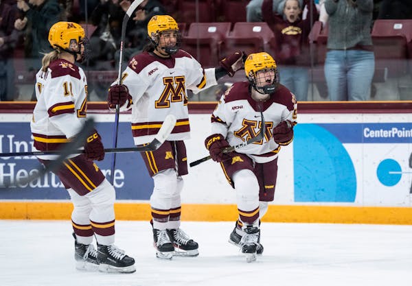 Gophers defenseman Madeline Wethington, right, scored the team’s lone goal in Saturday’s 5-1 loss to Ohio State. Minnesota plays No. 8 Wisconsin t