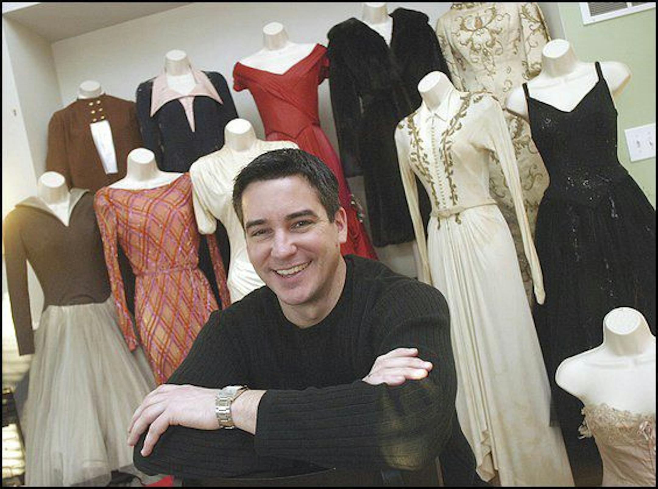 Michael Siewert, above, and his collection of Judy Garland memorabilia, including 14 dresses.