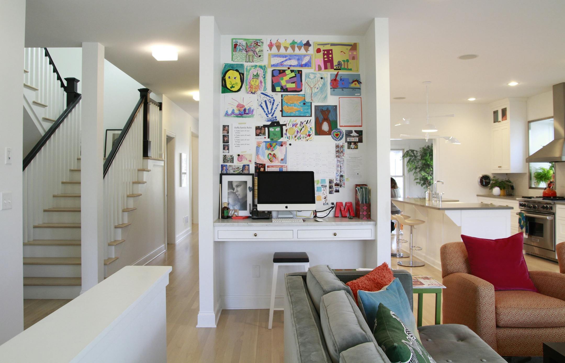Family friendly design - interior showing work station area off the living room and kitchen of the Linden Hills home featured on HGTV. Mekea Duffy.