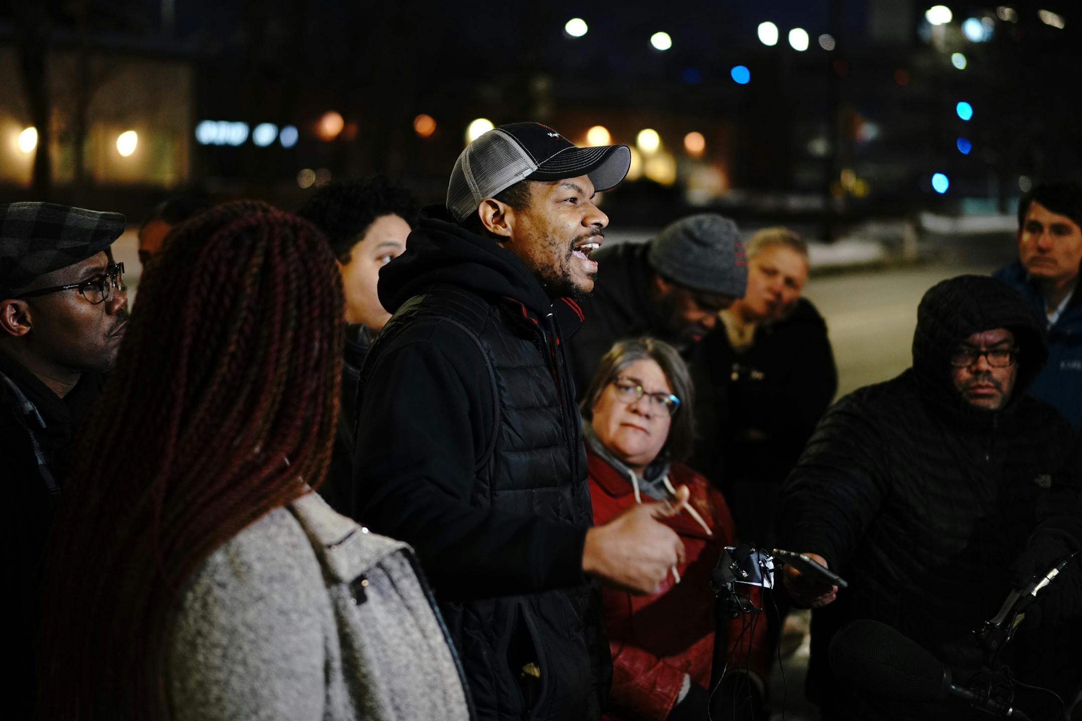 Activist Marques Armstrong called on officers who didn't respect their community to leave the department. ] MARK VANCLEAVE • mark.vancleave@startribune.com * A handful of activists held a press conference in front of the Minneapolis Police Fourth Precinct demanding the swift termination of the officers responsible for what they called racist decorations on a Christmas tree inside. Photographed Friday, Nov. 30, 2018.
