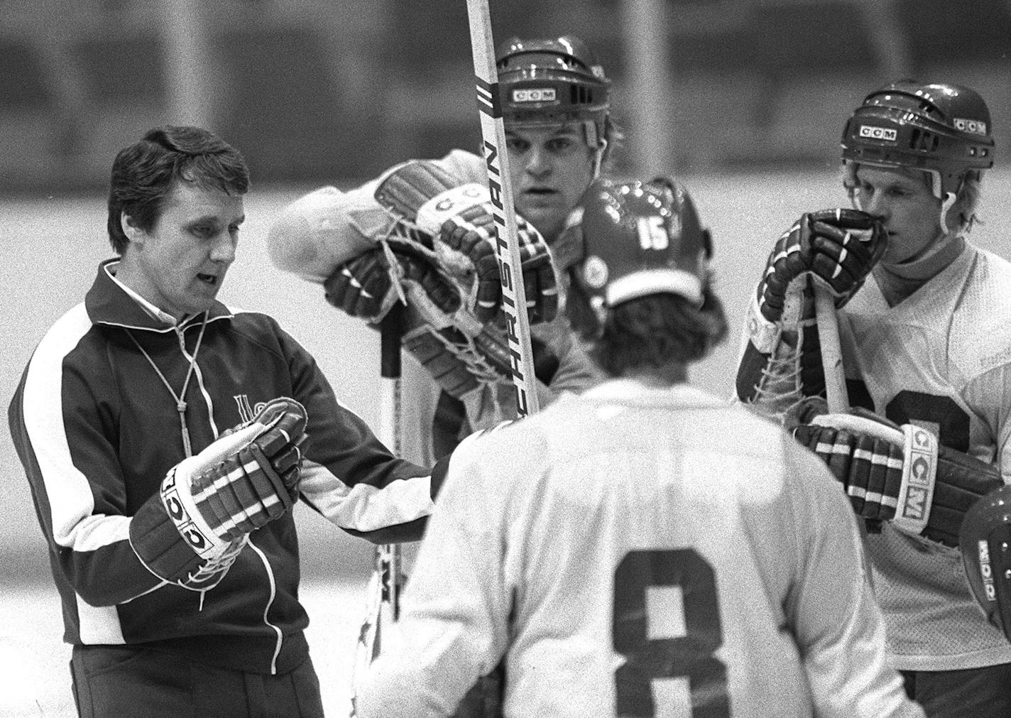 United States Olympic hockey coach Herb Brooks, speaks to members of the team during a break in practice