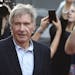 In this December 10, 2015 file photo, Harrison Ford greets fans during a "Star Wars" fan event in Sydney.