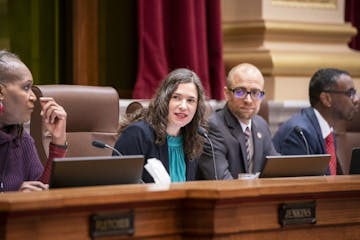 City Council president Lisa Bender, center, and other council members speak about the 2040 Comprehensive Plan before voting.