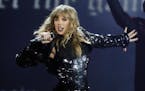FILE - In this May 8, 2018, file photo, Taylor Swift performs during her "Reputation Stadium Tour" opener in Glendale, Ariz. Swift will open the &#x20