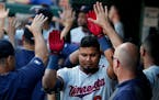The Minnesota Twins' Luis Arraez (2) celebrates after hitting a two-run home run against the Texas Rangers in the second inning at Globe Life Park in 