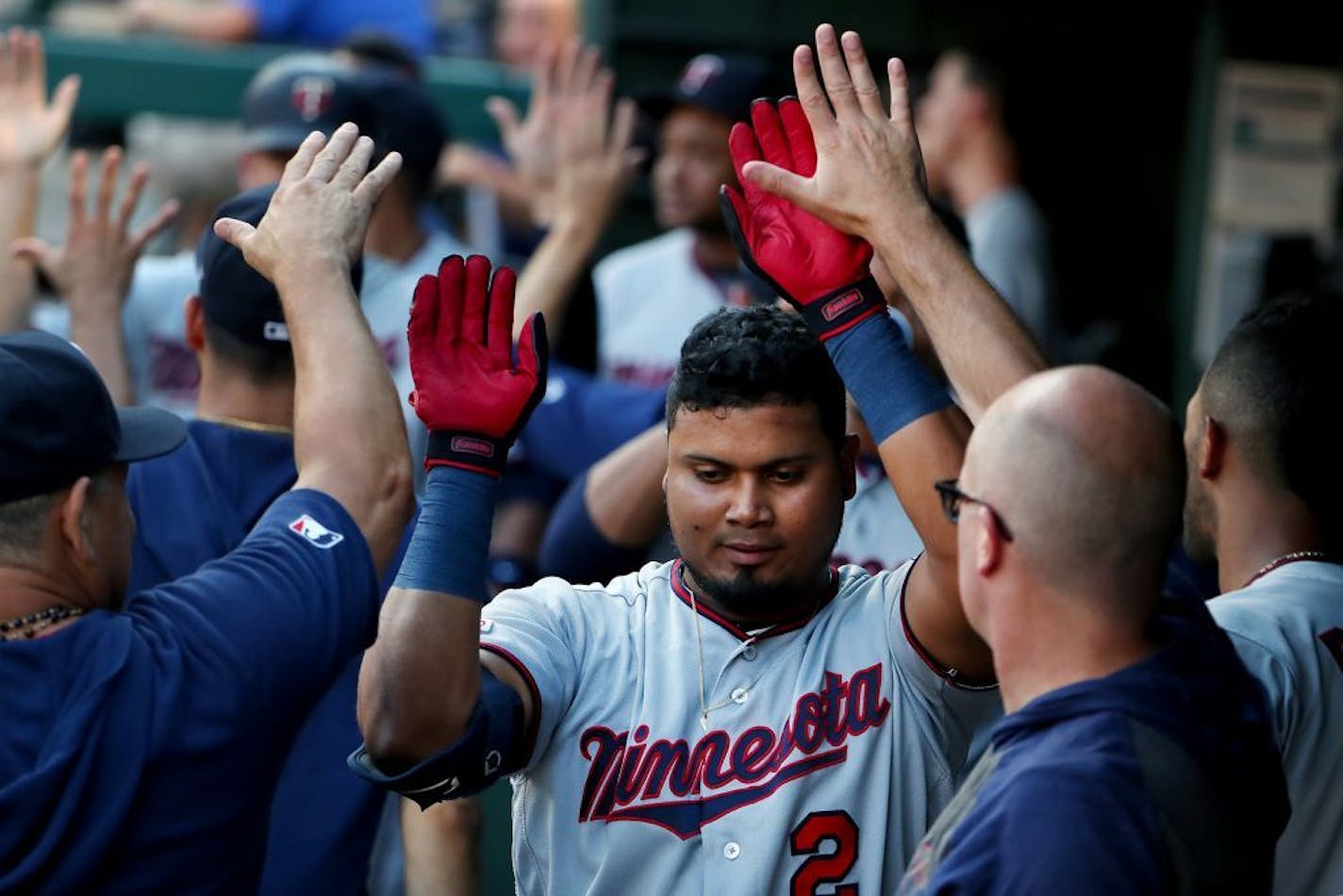 The Minnesota Twins' Luis Arraez (2) celebrates after hitting a two-run home run against the Texas Rangers in the second inning at Globe Life Park in Arlington on Thursday, Aug. 15, 2019, in Arlington, Texas. The Twins won, 13-6.