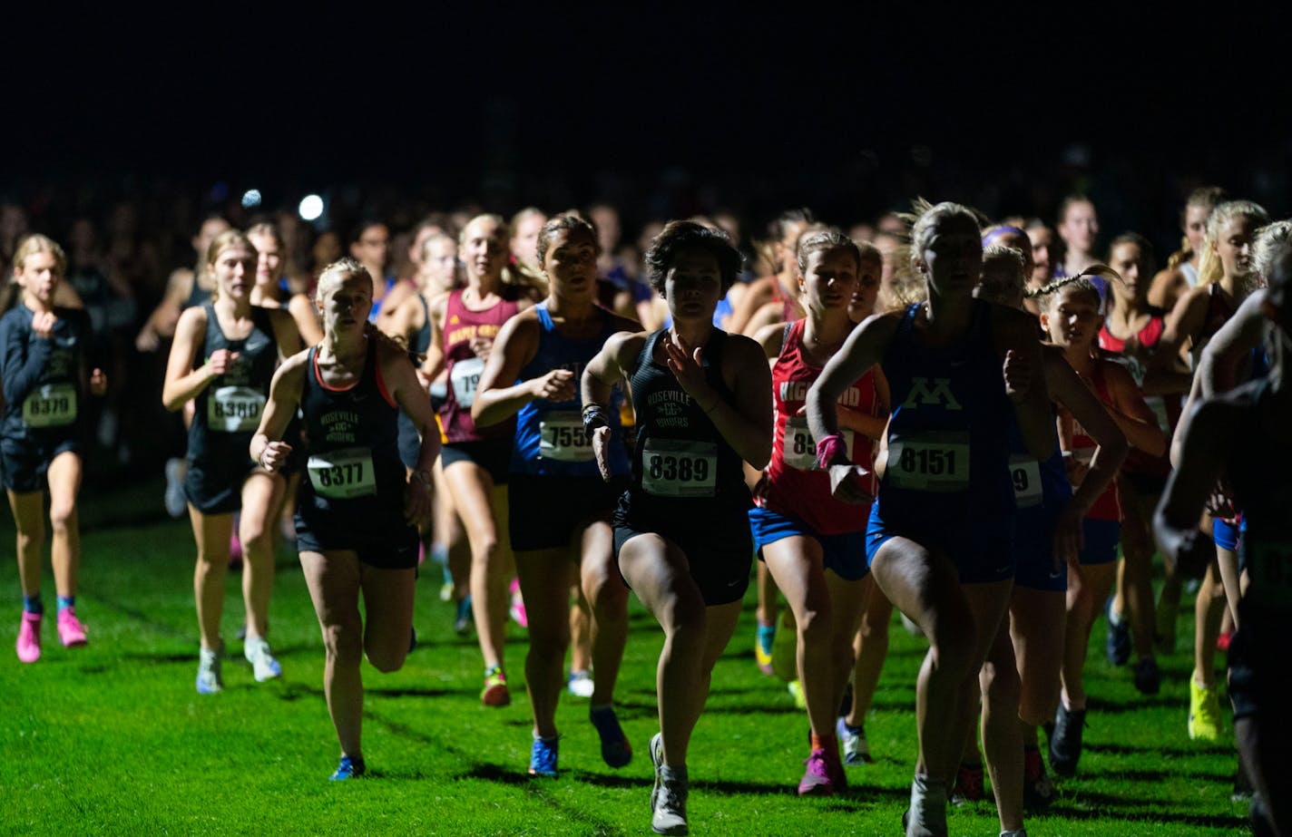 Runners begin the girls varsity race during the 58th Annual Metro Invitational at Flying Cloud fields in Eden Prairie