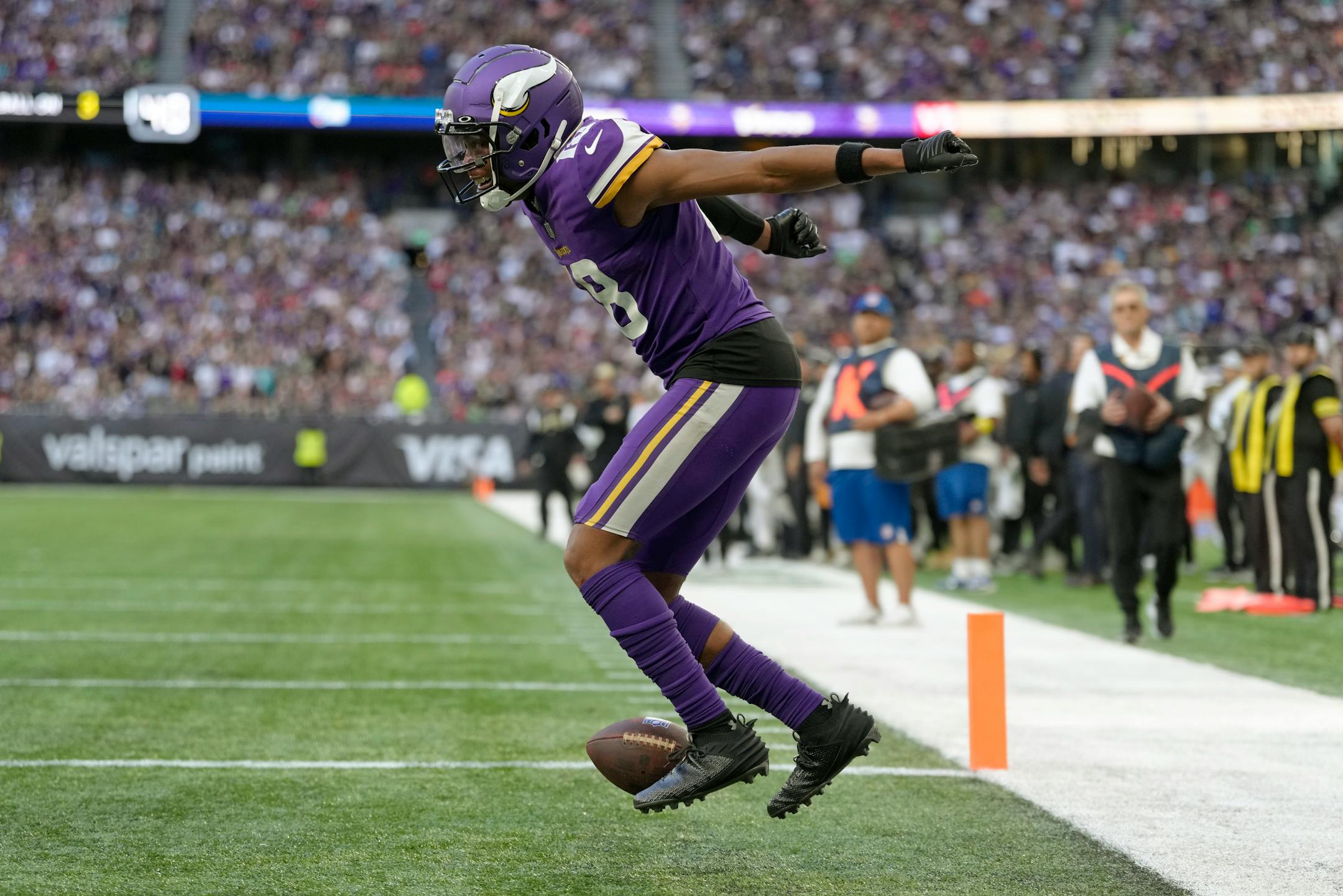 Minnesota Vikings wide receiver Justin Jefferson (18) celebrates after scoring a touchdown in the fourth quarter.