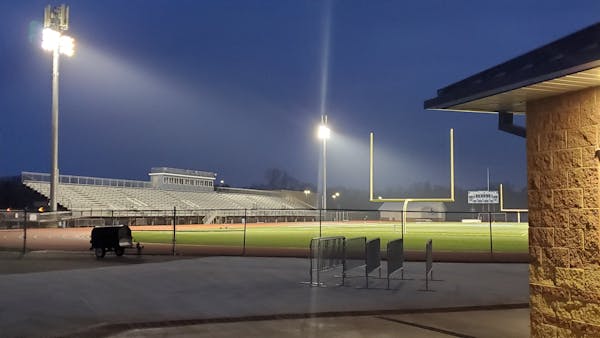 Hopkins High School football field lit up on April 6, 2020, as part of #BethelightMN during COVID-19 pandemic. (Ken Chia/Star Tribune)