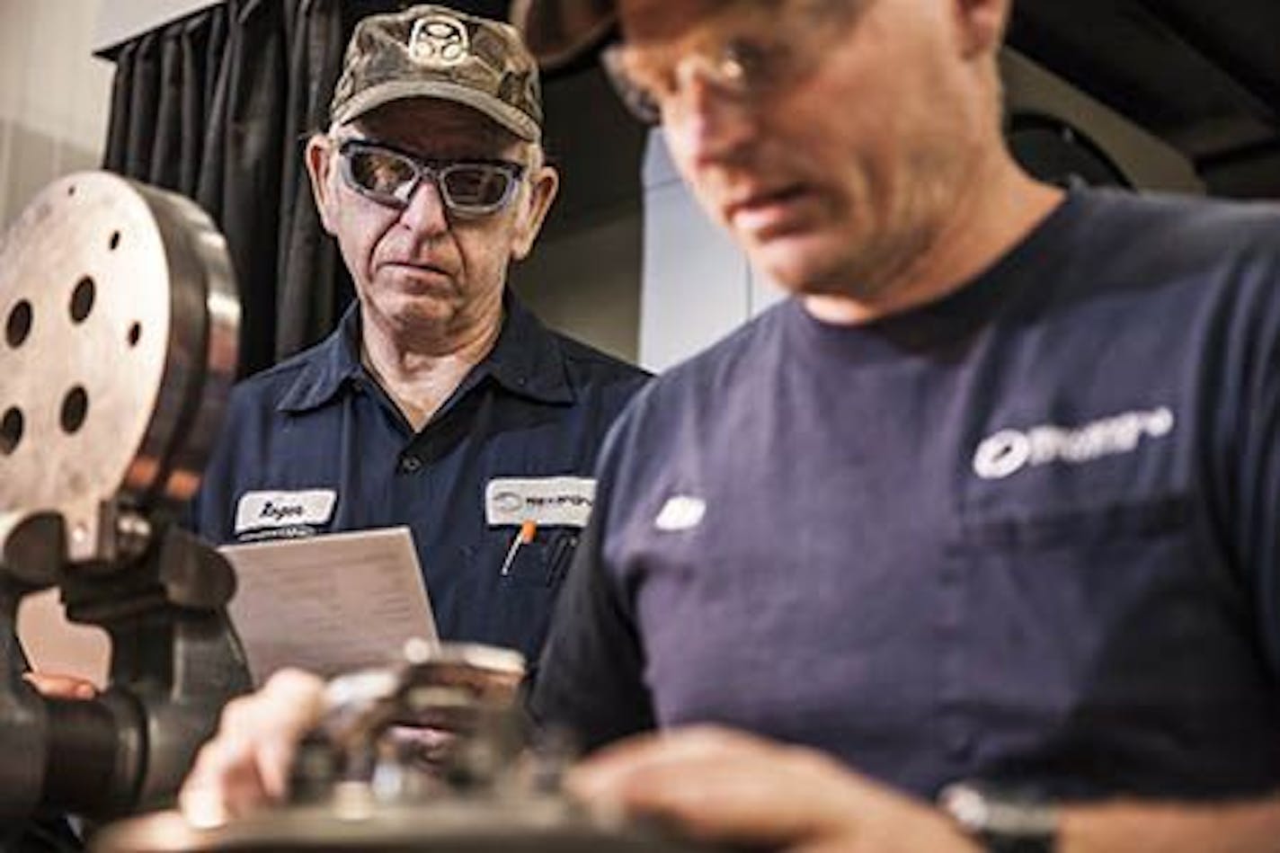 Roger Klug, 68, at left, senior aluminum die corrector, has worked at Alexandria Industries for 46 years. When considering retirement, the company asked the industry expert to delay retirement and work part time. Klug now works two days a week plus fills in for vacationing co-workers.