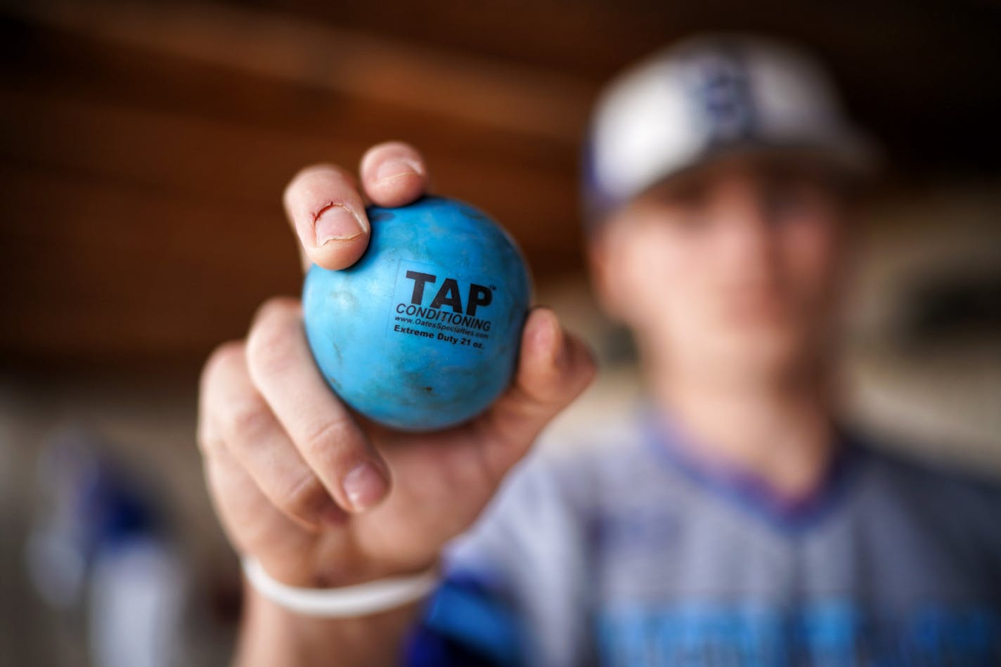 Heritage Christian senior Seth Halvorsen, one of the top pitchers in Minnesota's Class of 2018, trains and warms up with weighted baseballs to increase the velocity of his pitches. He was throwing in the low-80s at the end of his sophomore year; now he's in the mid-90s. But some baseball and medical experts urge caution.