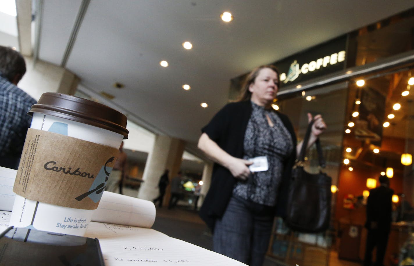 At the Caribou Coffee shop in the U.S. Bank building in downtown Minneapolis, customers in Minnesota will continue to see the Caribou Coffee brand while 88 stores East will be converted to Peet's Coffee & Tea .]rtsong-taatarii@startribune.com