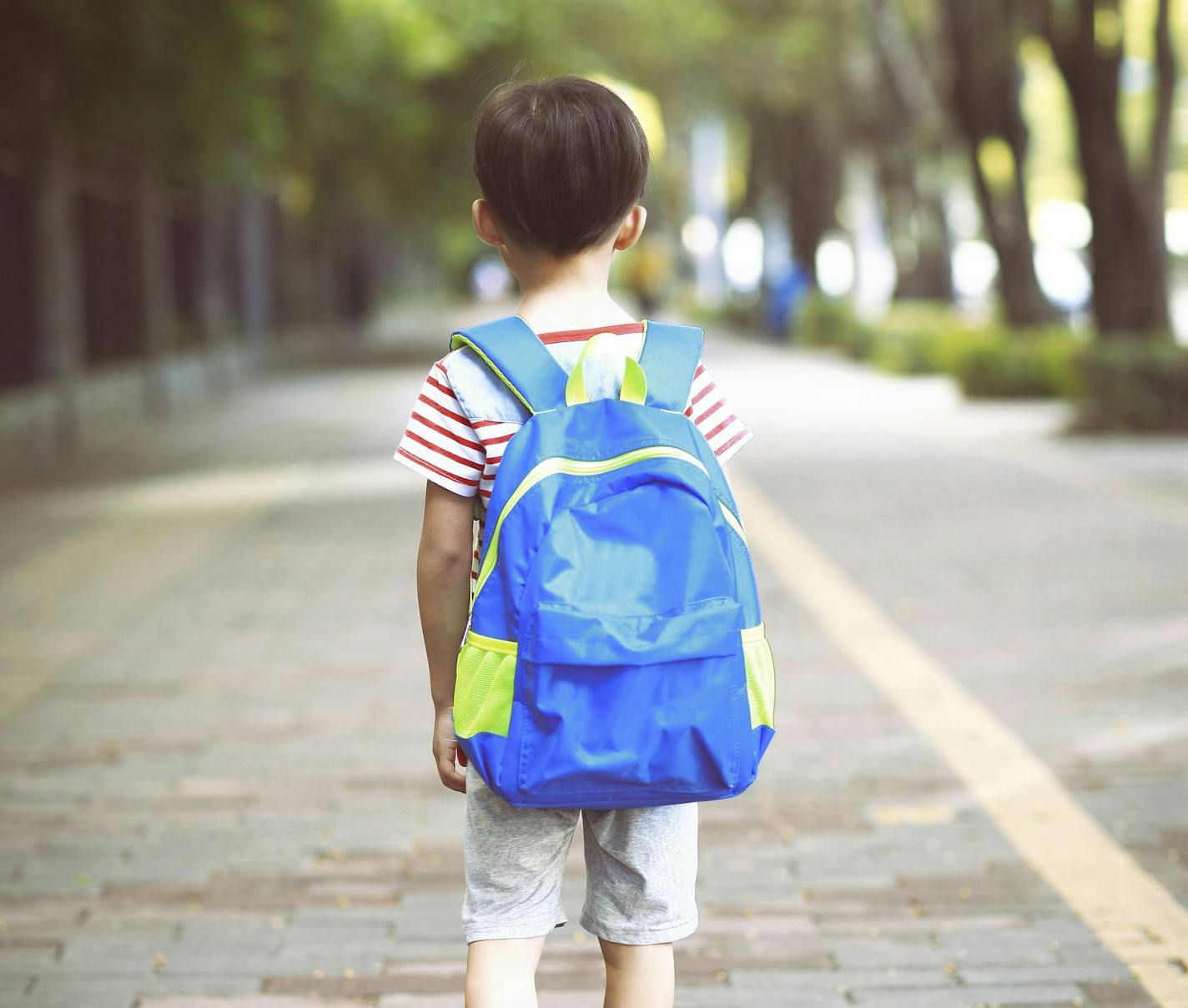 Little boy going to school with backpack ORG XMIT: MIN1607281416271210