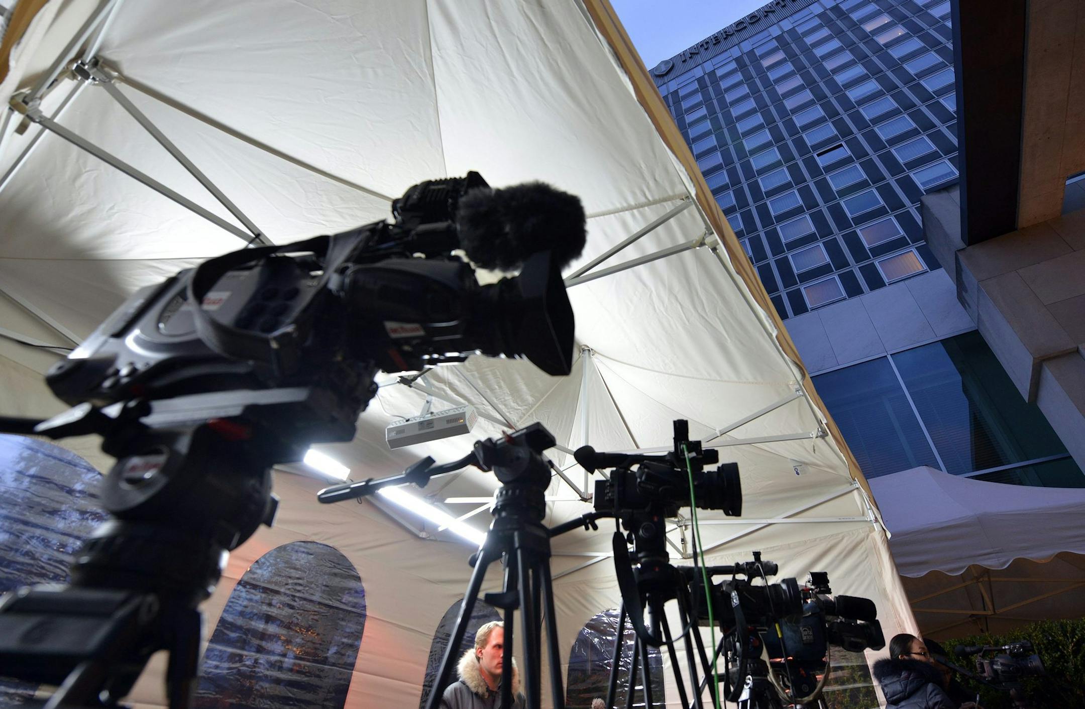 Cameras stand in front of hotel Intercontinental where closed-door talks on Iran's nuclear program take place in Geneva Switzerland, Thursday, Nov. 21, 2013. (AP Photo/Keystone,Martial Trezzini)