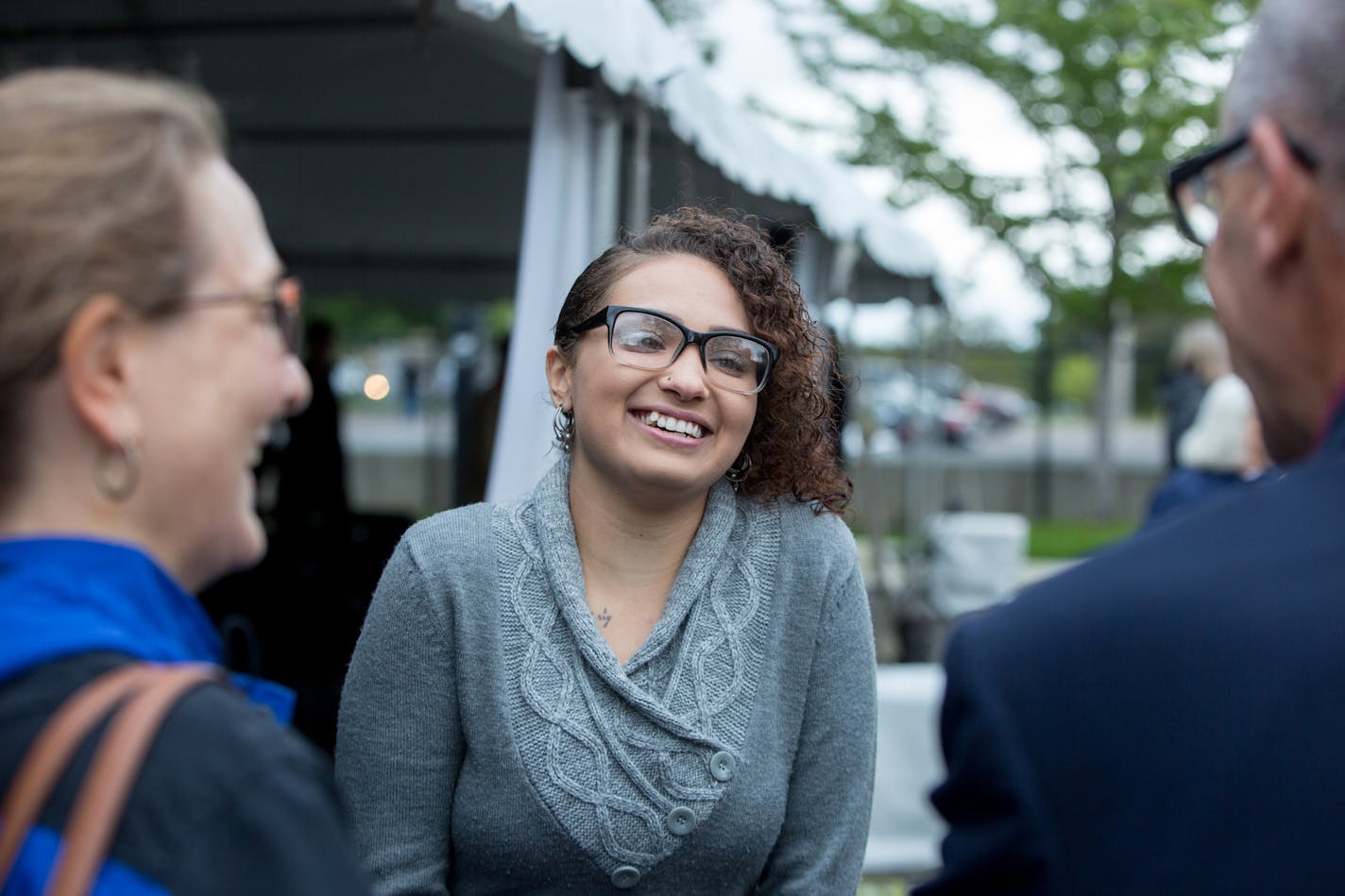 Danae Gilbert speaks to patrons during the grand opening of the 66 West apartments in Edina on Thursday. ] COURTNEY PEDROZA &#x2022; courtney.pedroza@startribune.com; Grand opening for 66 West Apartments; Edina, MN; exclusively for homeless youth; Aug. 3, 2017;