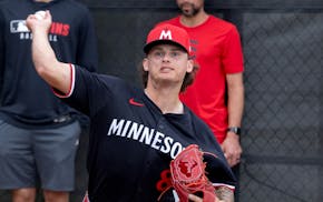 Travis Adams is back in the minor leagues after making no appearances during a major league stop with the Twins.