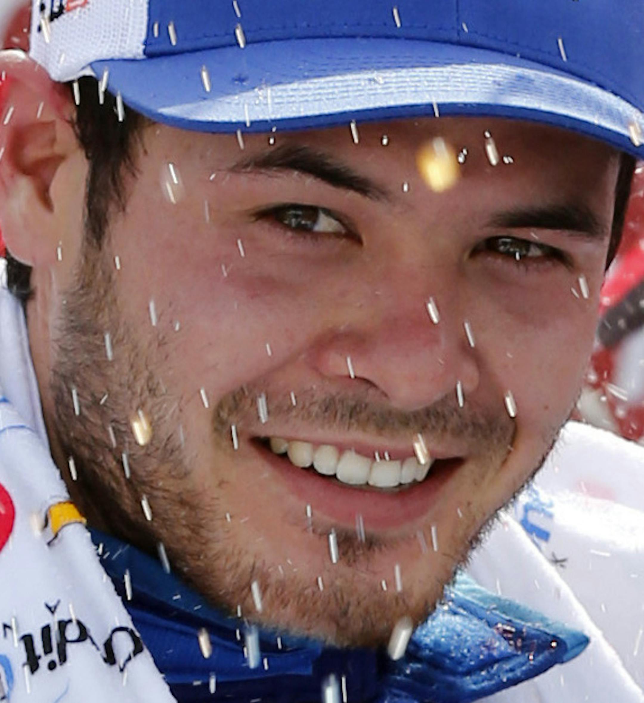 Kyle Larson celebrates in Victory Lane after winning the NASCAR Xfinity Series auto race at Richmond International Raceway in Richmond, Va., Saturday, April 29, 2017. (AP Photo/Steve Helber)
