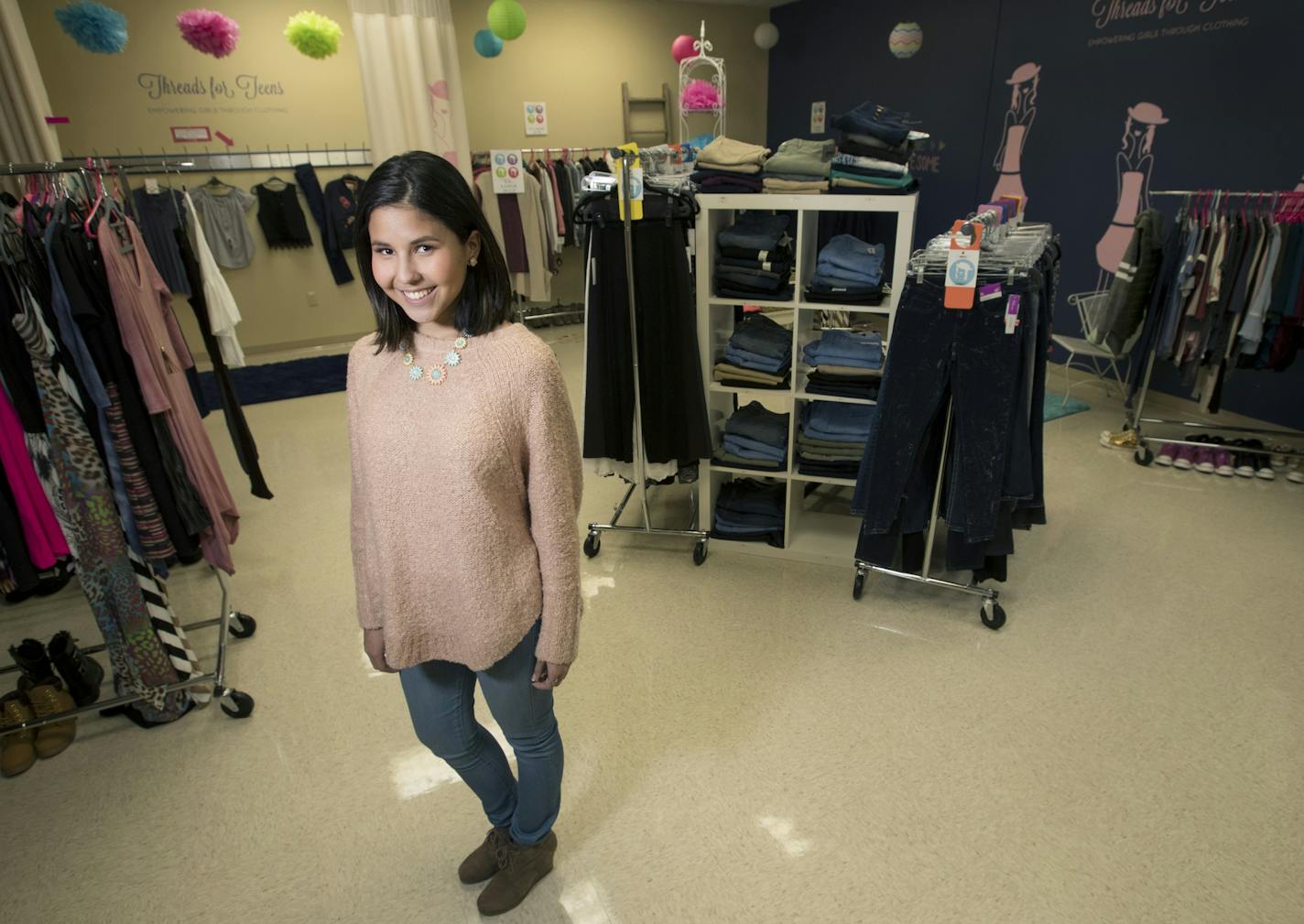 Grace Myler, 15, runs the nonprofit, "Threads for Teens", that clothes in-need girls. It just moved into a new space at the Shakopee Public Schools District Offices. ] CARLOS GONZALEZ &#xef; cgonzalez@startribune.com - March 8, 2017, Shakopee, MN, Nonprofit sets up clothing store in Shakopee School District office for kids in need.