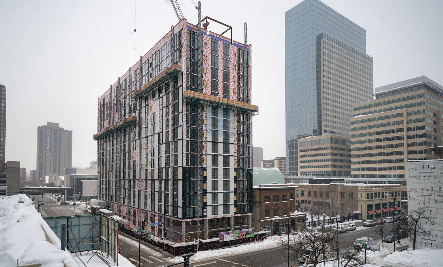 Minneapolis City Club, under construction at 95 S 10th St. at the corner or 10th and Marquette. ] GLEN STUBBE &#x2022; glen.stubbe@startribune.com Friday, March 1, 2019 Crews are putting the finishing touches on three towers apartment towers in downtown Minneapolis with a combined nearly 800 high-end apartments that will hit the market this summer. Those mid-rise towers, which range from 14 to 26 stories tall, represent the bulk of the 1,100 units that are expected to hit the rental market in th