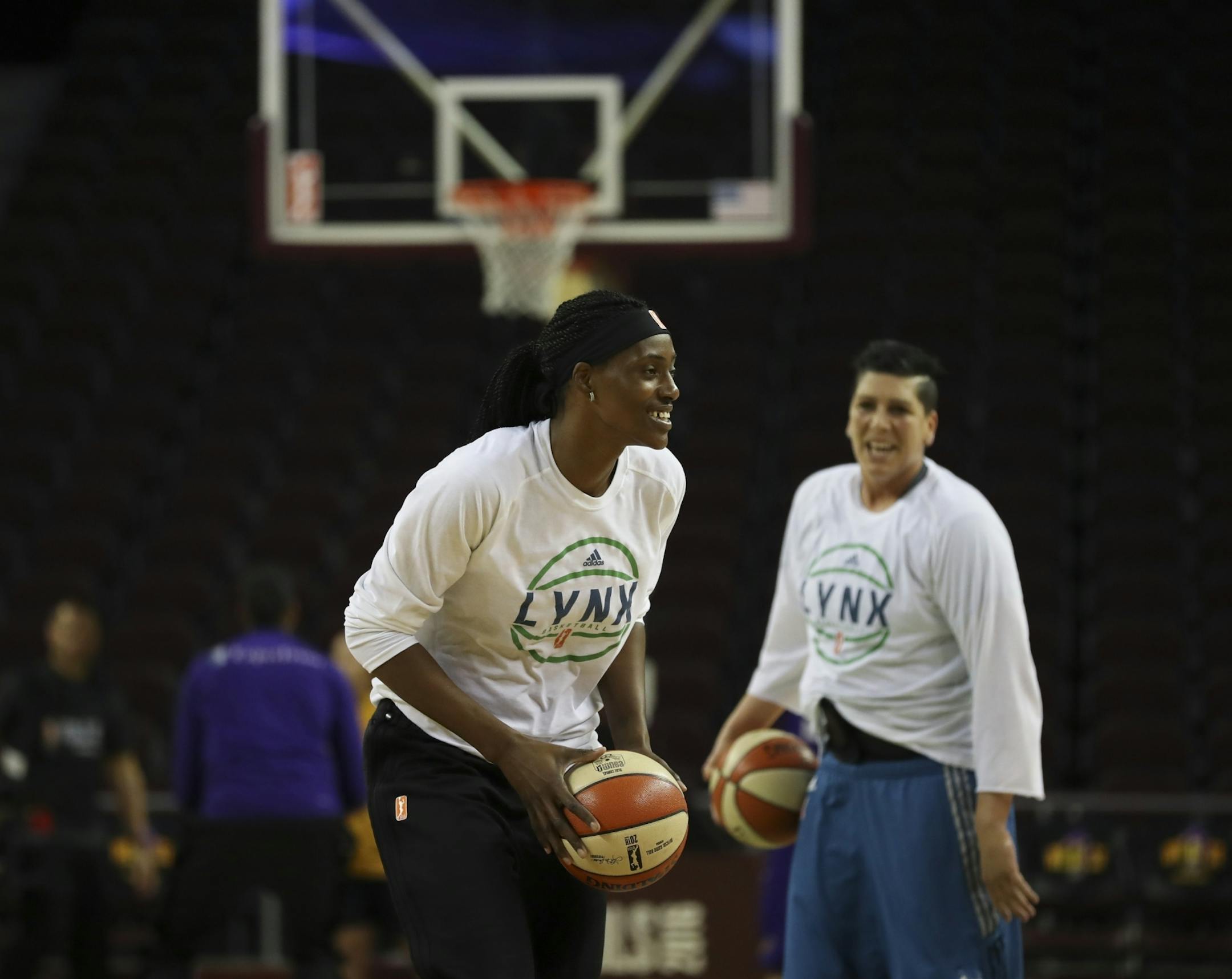 Minnesota Lynx center Sylvia Fowles (34) and Minnesota Lynx center Janel McCarville (4) warmed up before Friday night's game at the Galen Center in Los Angeles.