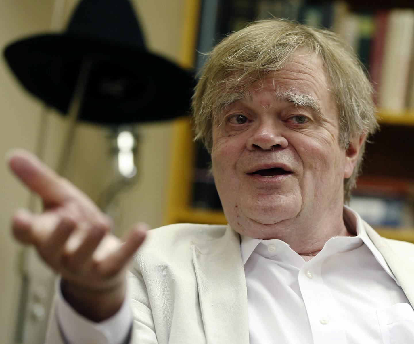 FILE - In this July 20, 2015, file photo, Garrison Keillor, creator and host of "A Prairie Home Companion," appears during an interview in St. Paul, Minn. The former radio host said he hopes the sexual allegations against him are fading way and believes Minnesota Public Radio made a grave mistake when it cut its ties with him. The Daily Courier in Prescott, Ariz., reported that Keillor made his comments Wednesday, Feb. 28, 2018, after appearing before hundreds of fans in Arizona in his first sho