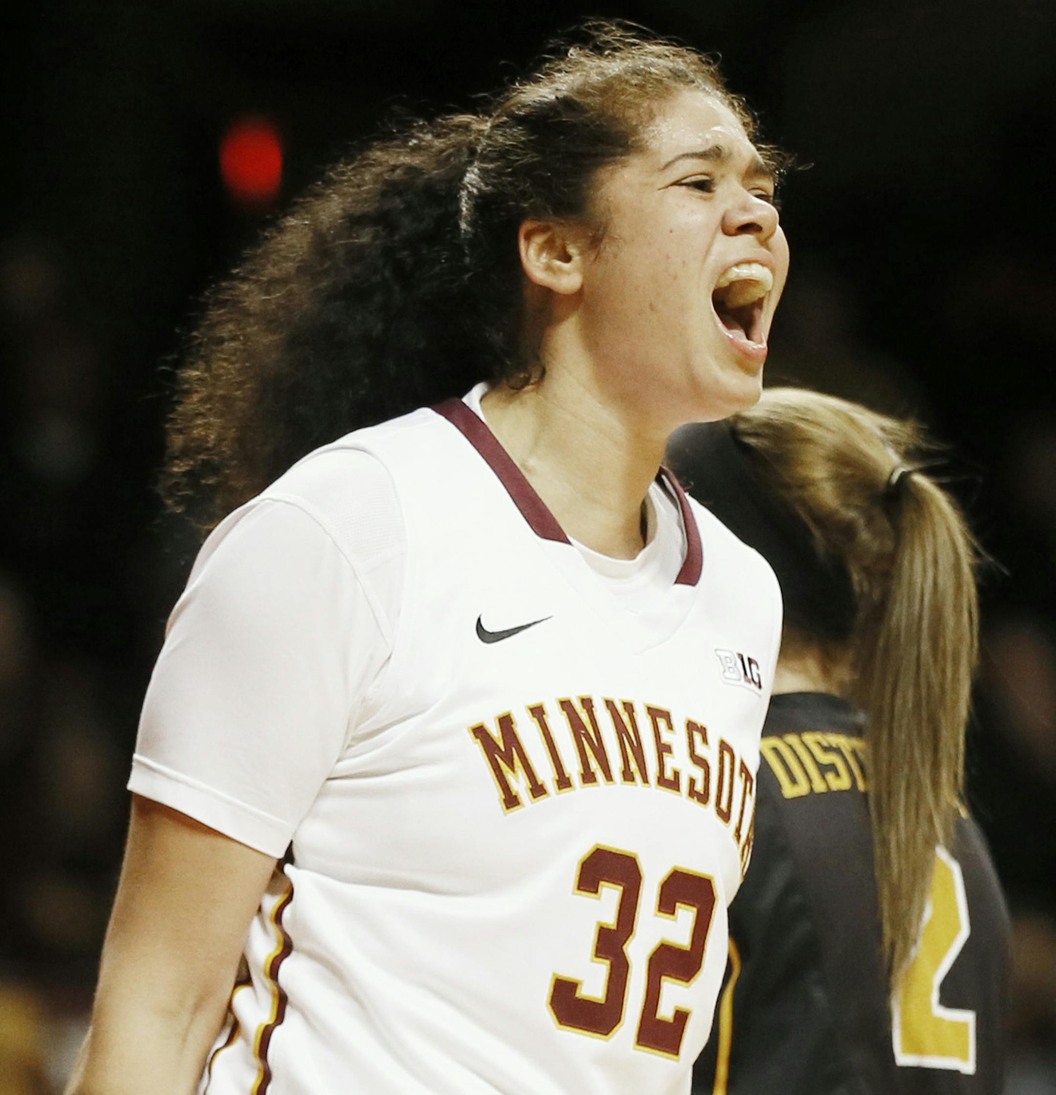 Minnesota Golden Gophers center Amanda Zahui B. (32) celebrated with teammate Shae Kelley (23) after scoring in the second half. Minnesota beat Iowa 93-80 at Williams Arena Tuesday February 17, 2015 in Minneapolis MN. ] Jerry Holt/ Jerry.Holt@Startribune.com ORG XMIT: MIN1502172207141124 ORG XMIT: MIN1503032012210641