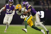 Vikings cornerback Mekhi Blackmon, right, played through a shoulder injury against the Packers on Sunday. He’ll stay on the sidelines this weekend a