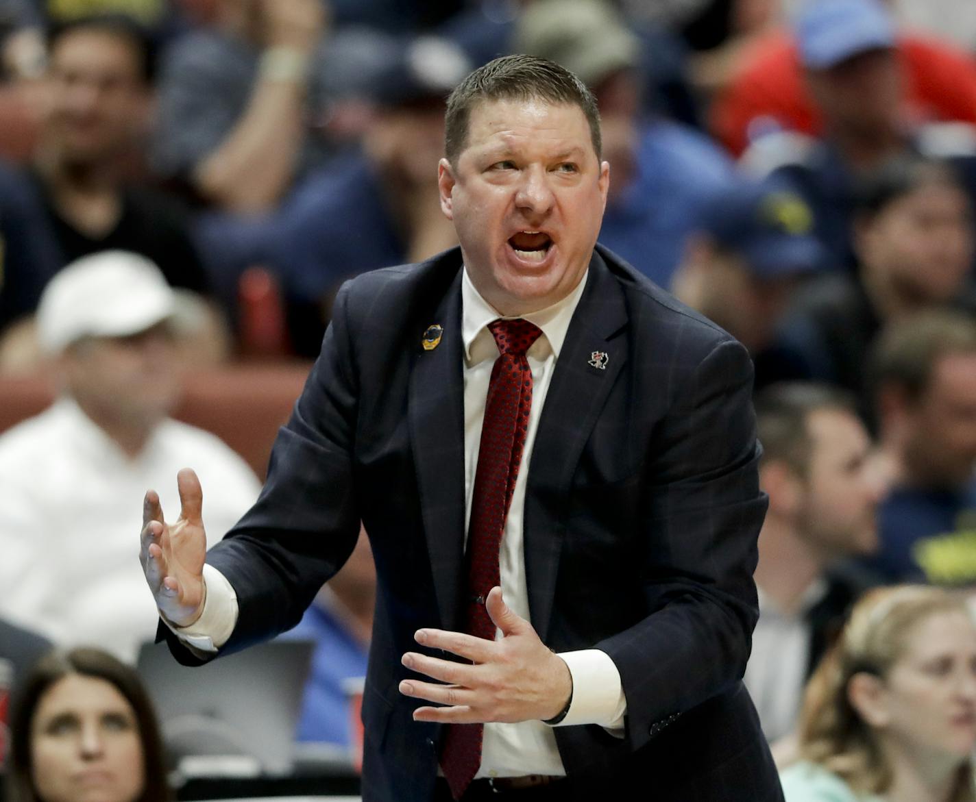 Texas Tech coach Chris Beard yells during the second half the team's NCAA men's college basketball tournament West Region semifinal against Michigan on Thursday, March 28, 2019, in Anaheim, Calif. (AP Photo/Marcio Jose Sanchez)